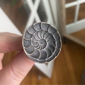 Spiral staircase sterling silver ring from Ecclesia Jewelry.